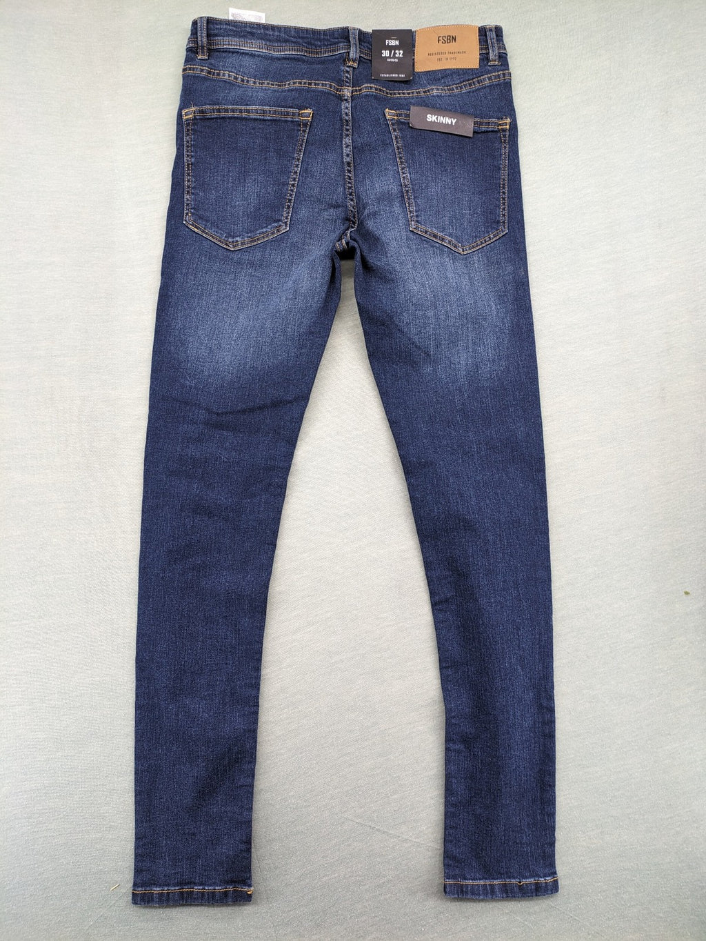 FSBN blue skinny jeans dark wash classic 5-pocket design with button closure