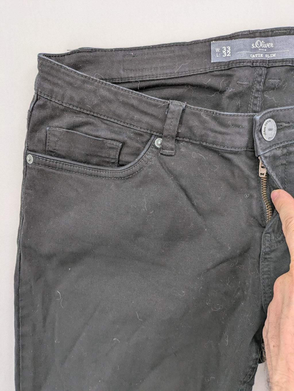 s.Oliver black slim fit jeans with low rise and classic design details.