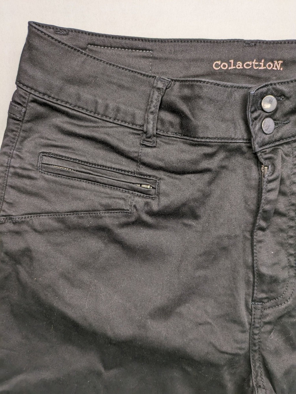 Colac black straight jeans high waist with double button, zipper pockets, and stretch material.