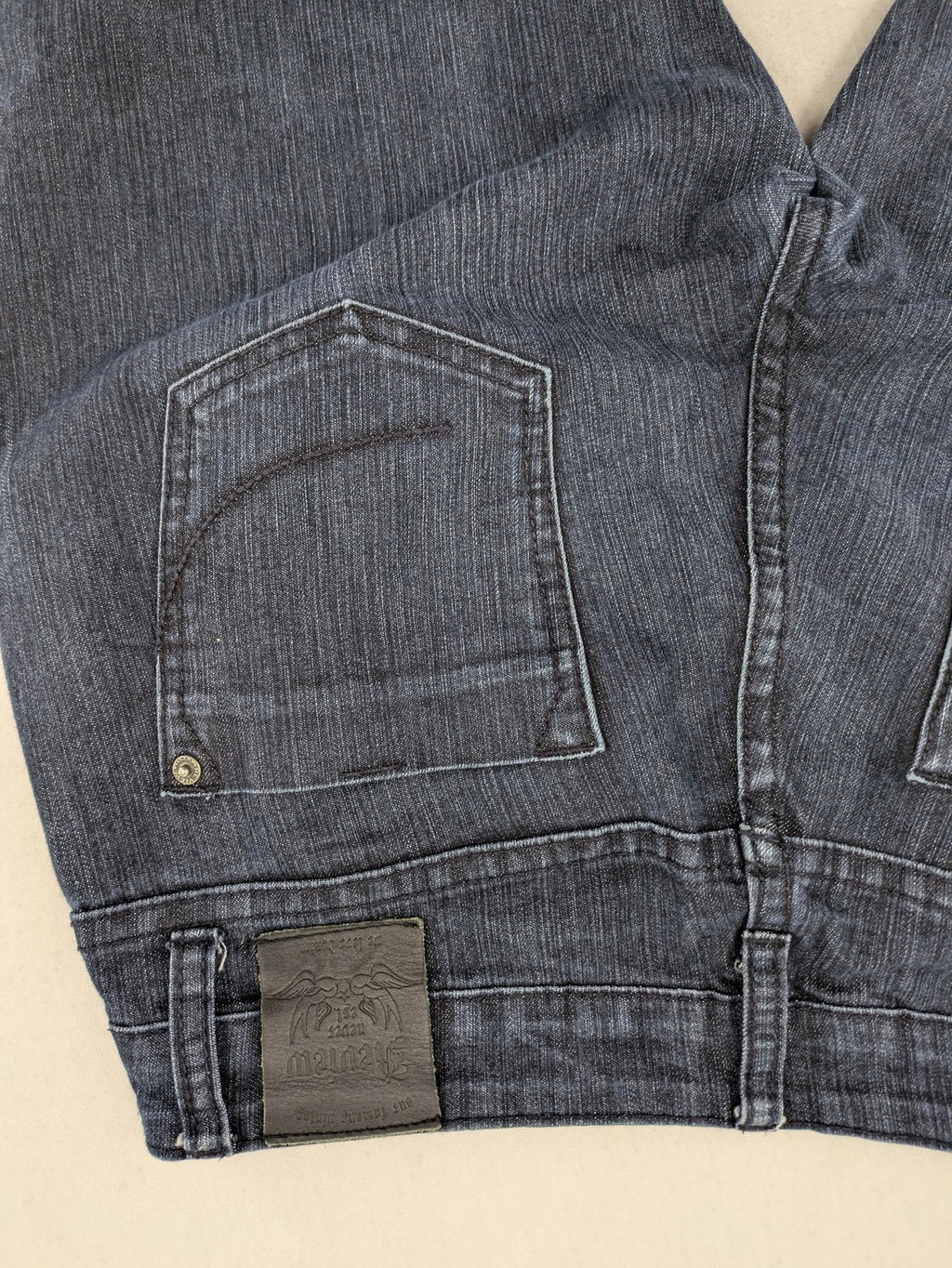 Review straight leg jeans dark blue low rise stretch denim with classic design.