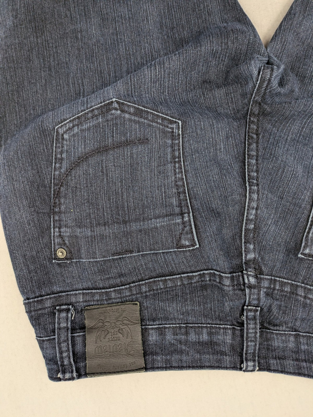 Review straight leg jeans dark blue low rise stretch denim with classic design.