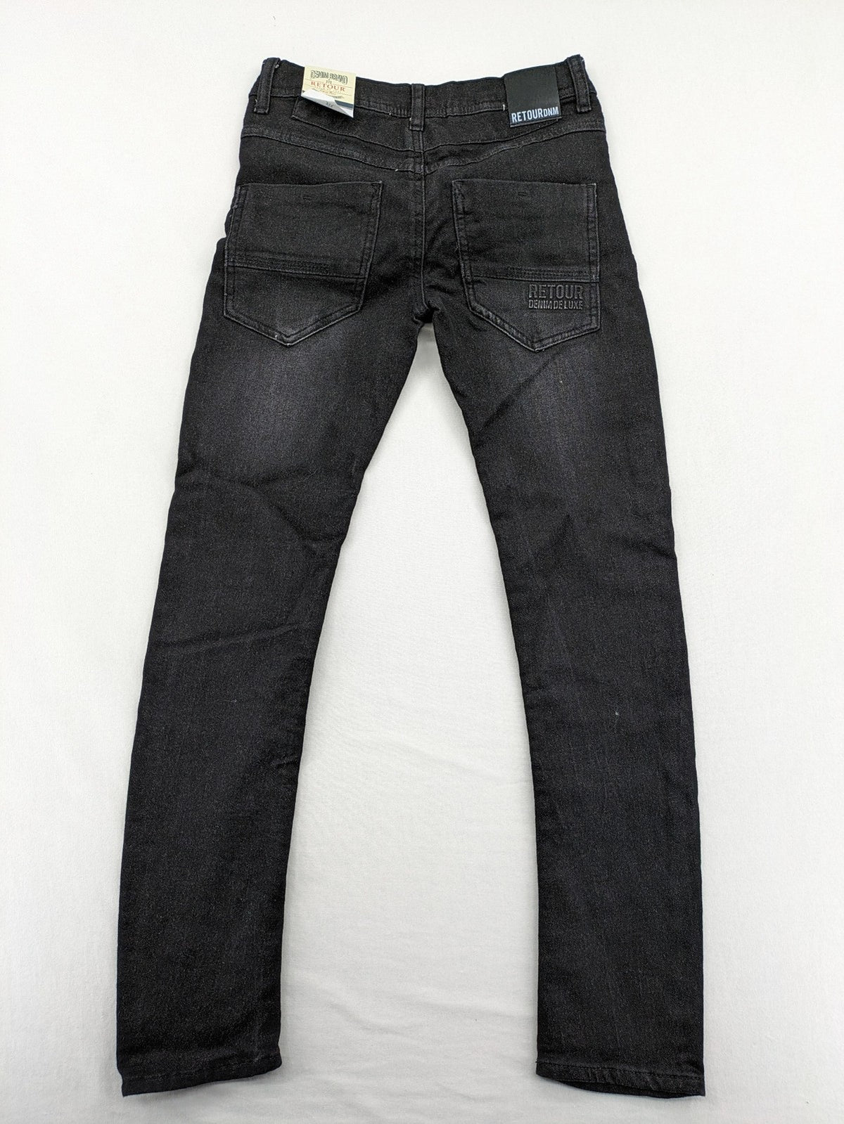 Skinny black straight jeans with distressed details and logo, made from durable denim.