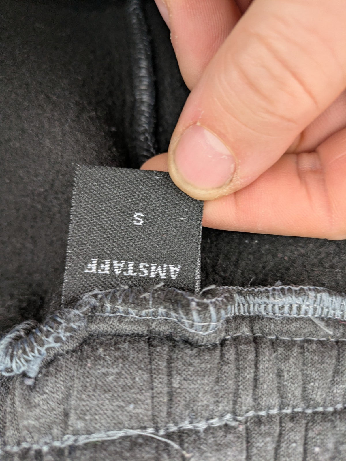 Amstaff grey sweatpants with large dog logo and "Trust & Loyalty" text.