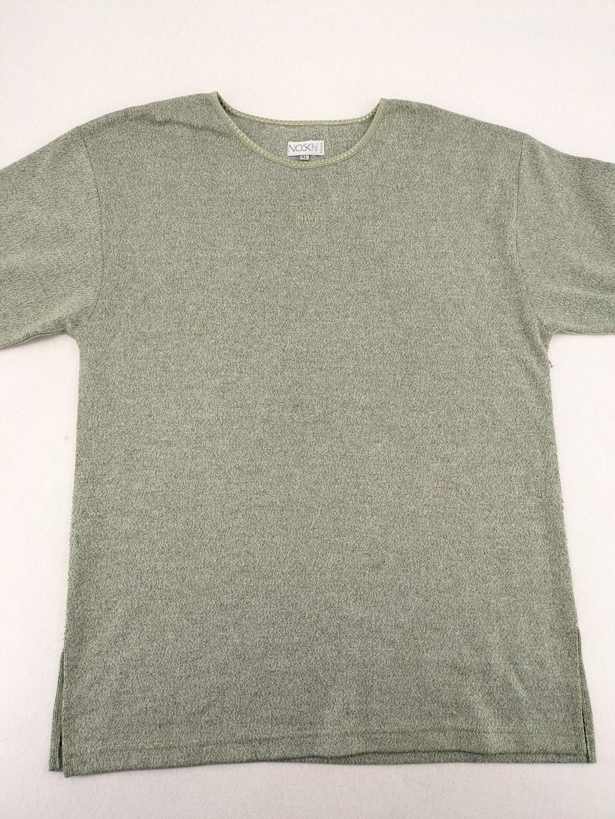 NOSCH knit jumper grey textured fabric with embroidered logo and subtle rhinestone accents.