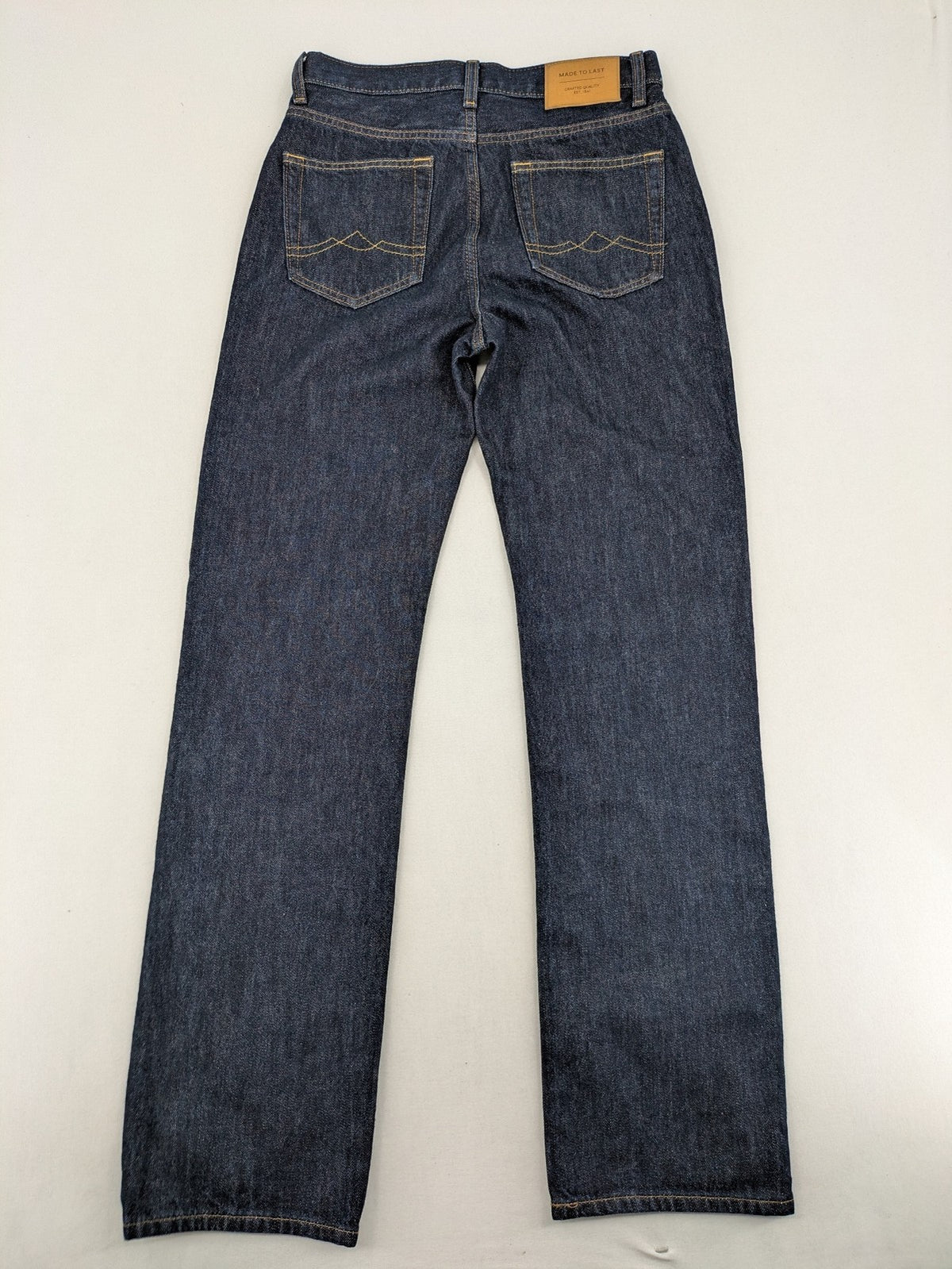 C&A blue straight jeans W28 L32 with 5-pocket design and contrasting orange stitching.