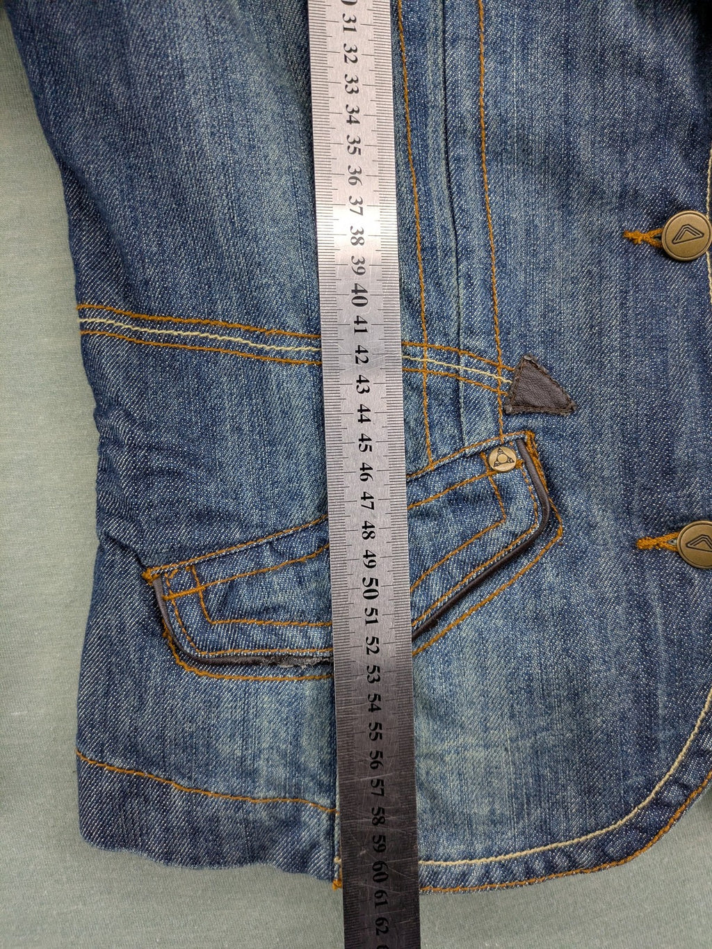 Authentic Clothing Company blue jeans blazer with contrast stitching and button closure.