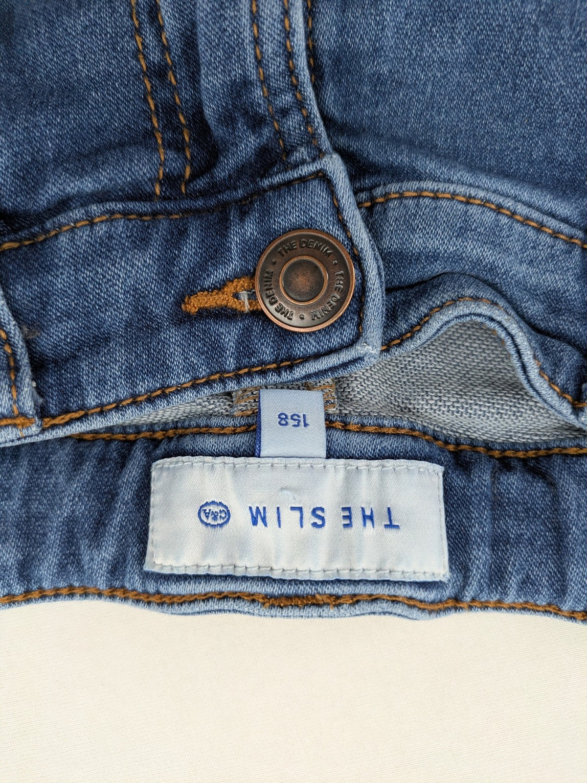 C&A blue straight jeans medium wash 5-pocket style with zipper and button closure