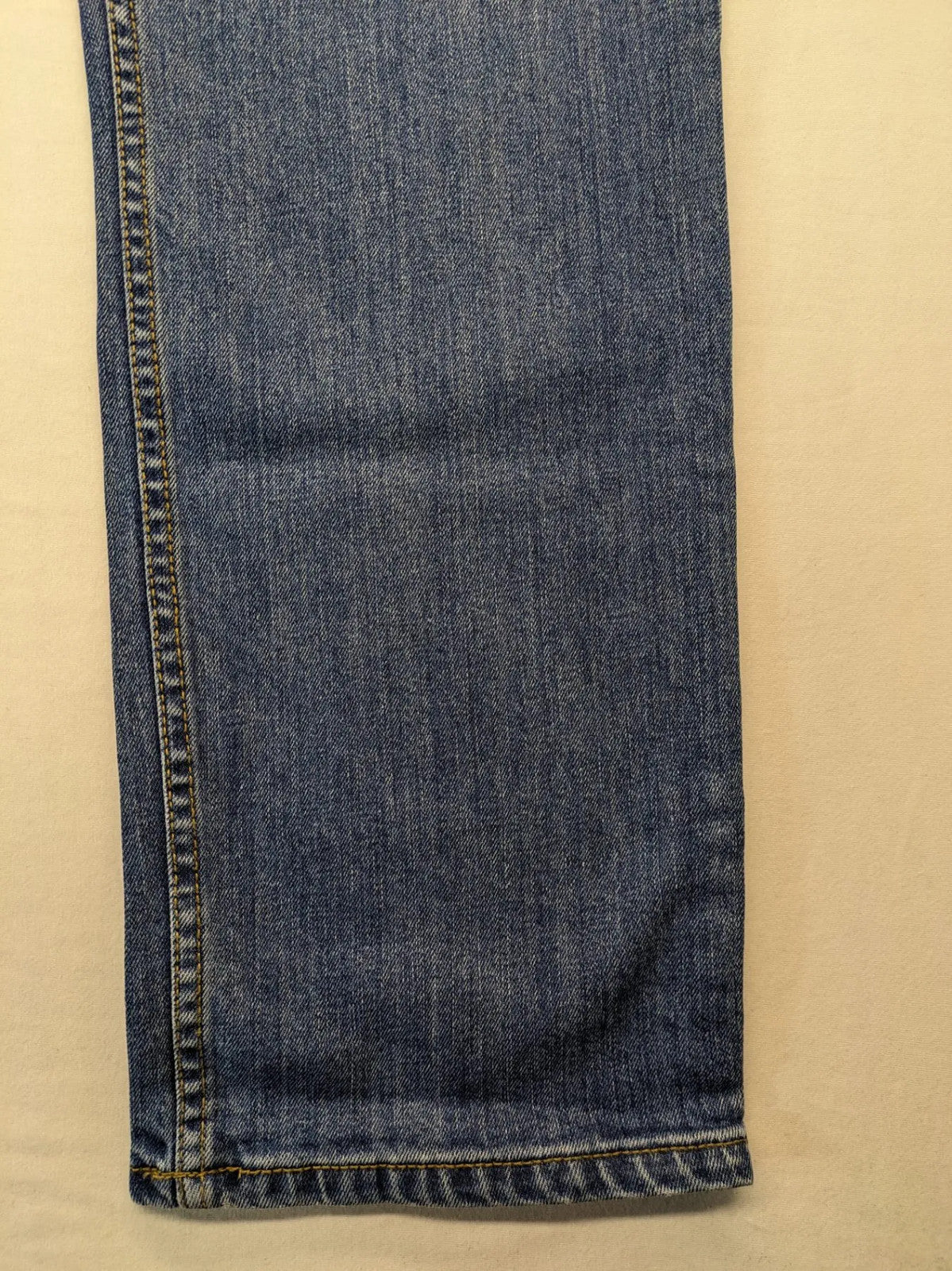Hero By John Meddox blue straight jeans with five-pocket design and zip fly.