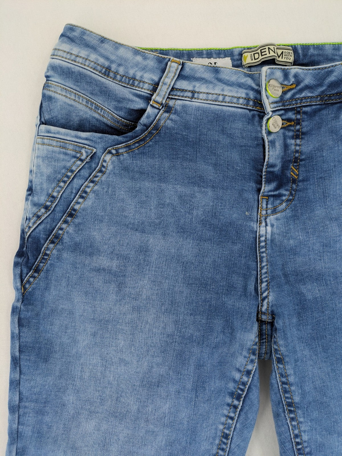 Street One blue straight jeans with green patterned cuffs and button fly detail.