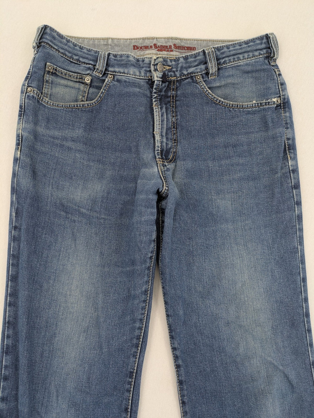 Joker blue straight leg jeans with double saddle stitched detail and classic denim wash.