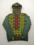 Diweye Creations multi turtle neck jumper with vibrant African print and soft green material.