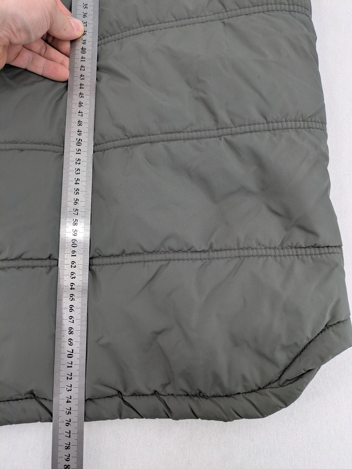 Camargue grey quilted jacket with fleece collar and buttoned pockets.