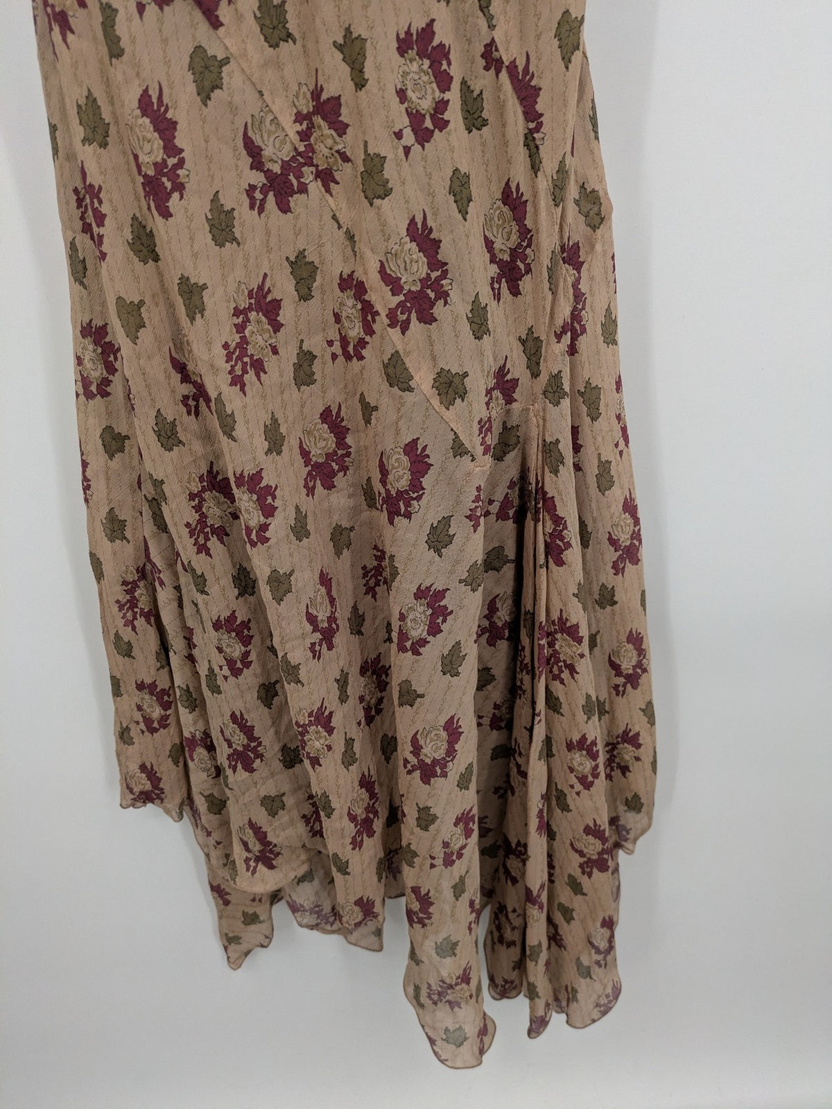 Zara Woman beige bridal party dress with floral pattern and asymmetrical ruffle details.