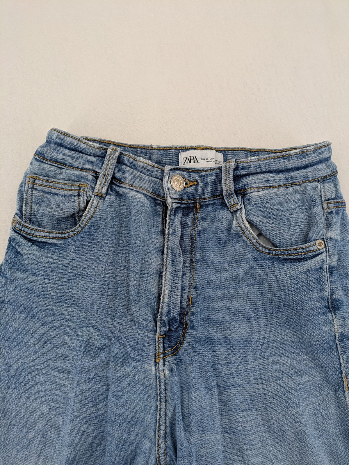 Zara blue high waist skinny jeans with classic wash and JOIN LIFE logo.