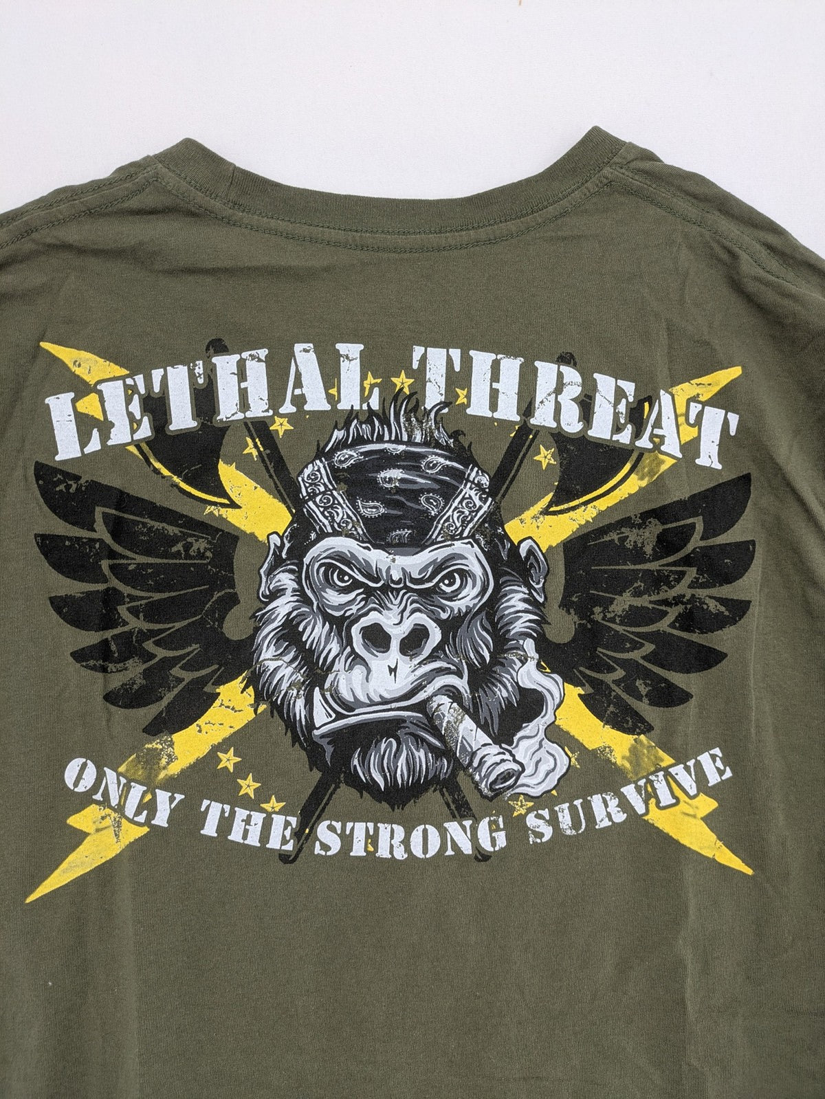 Lethal Threat multi band t-shirt featuring biker gorilla graphic and winged design.