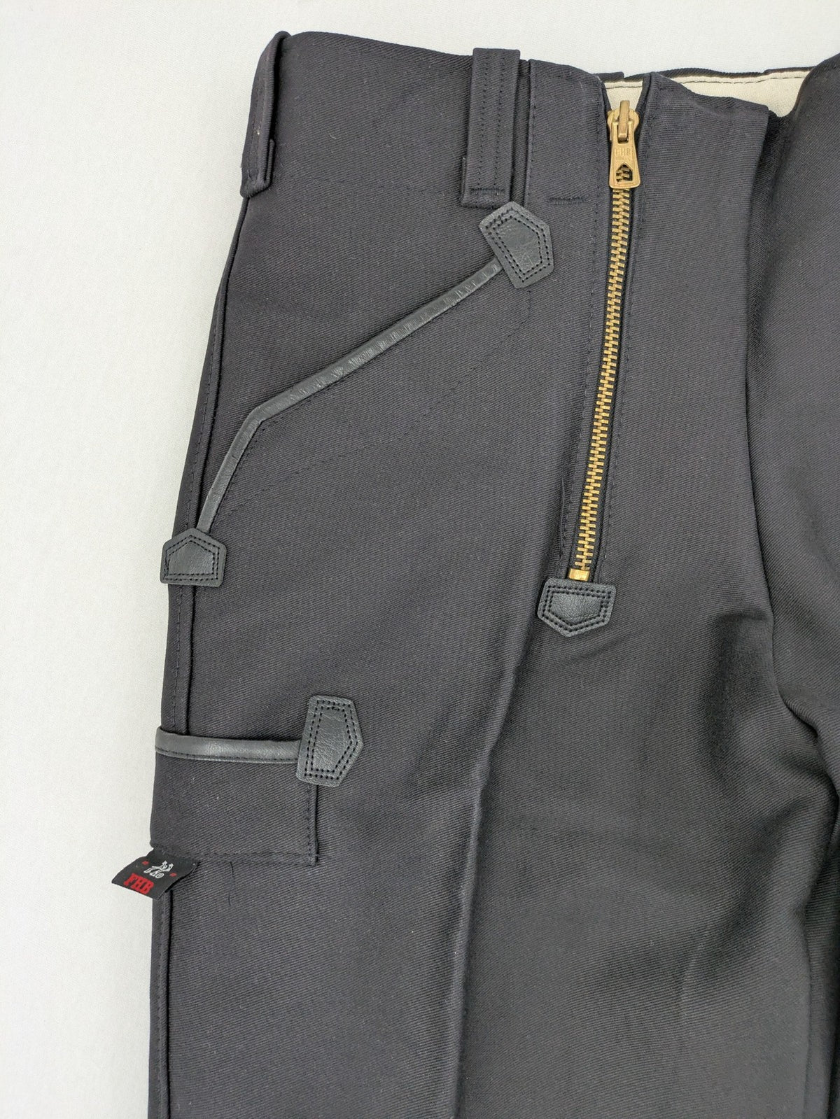FHB hunting pants grey with double zipper and leather reinforcements, made from 100% cotton.