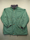 Canda green parka coat with dark lining, multiple pockets, and Micro Membrane technology.