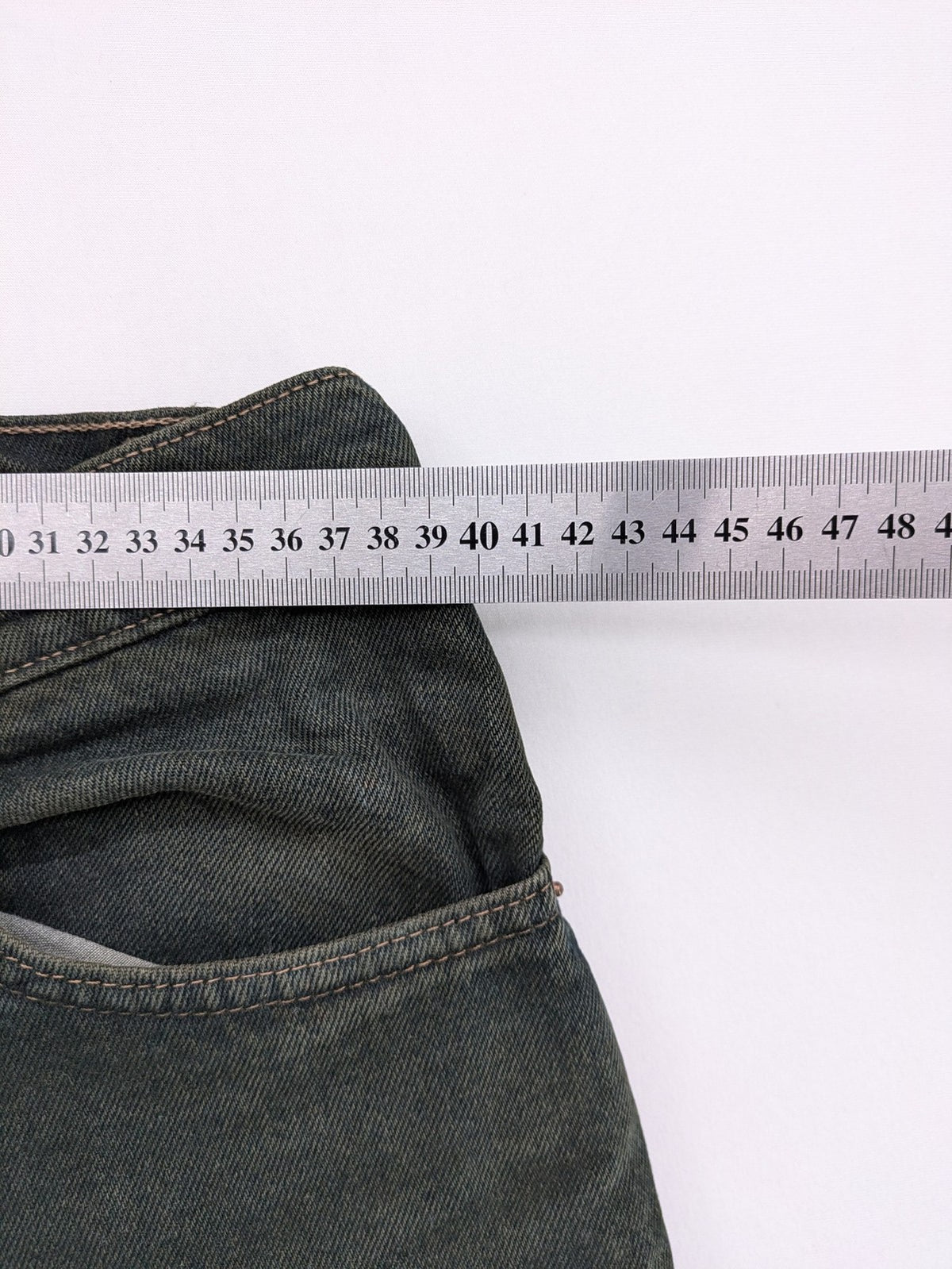 Levi's green 550 relaxed fit tapered jeans, vintage denim, made in USA.
