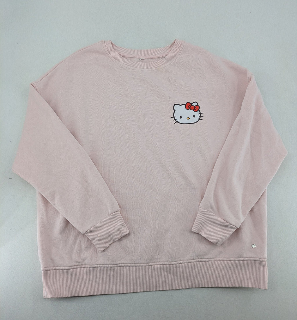 Hello Kitty pink sweatshirt classic graphic face logo on chest, long sleeves, round neck.