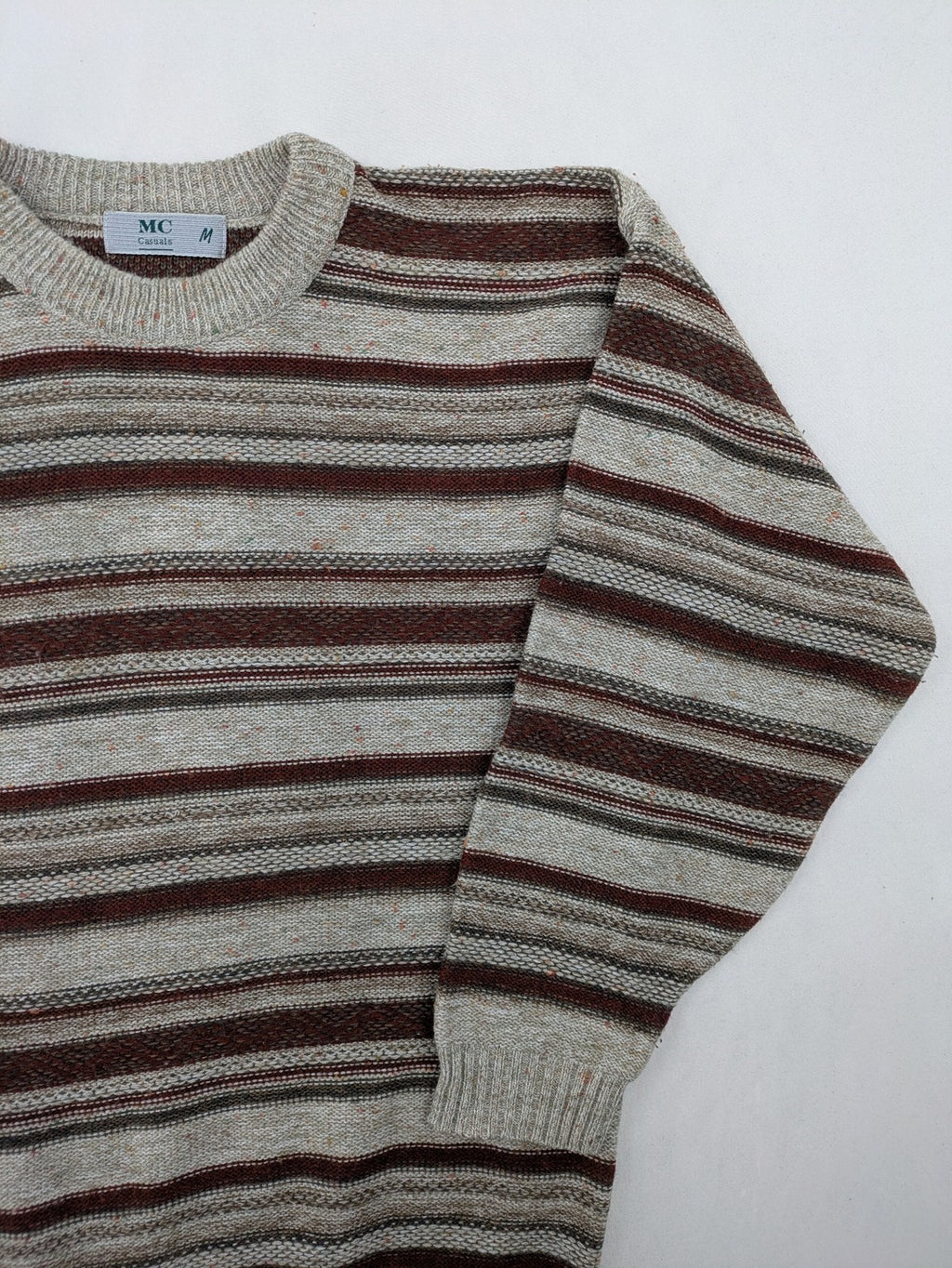 MC Casuals multi turtle neck jumper vintage striped pattern in brown and grey acrylic.