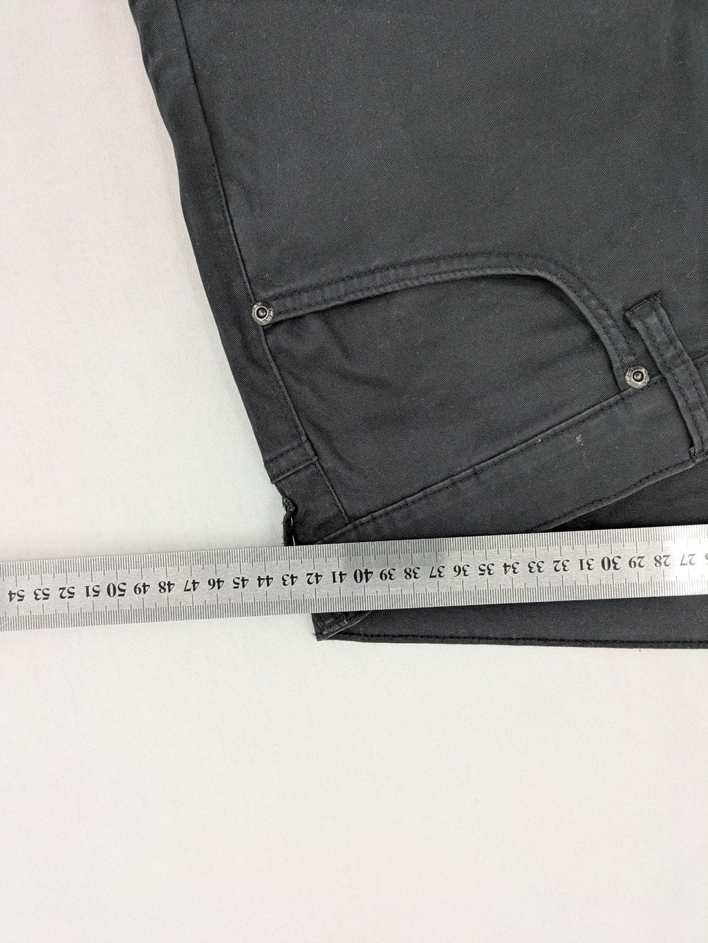 Lee straight jeans grey classic 5-pocket design with zip fly and subtle branding.