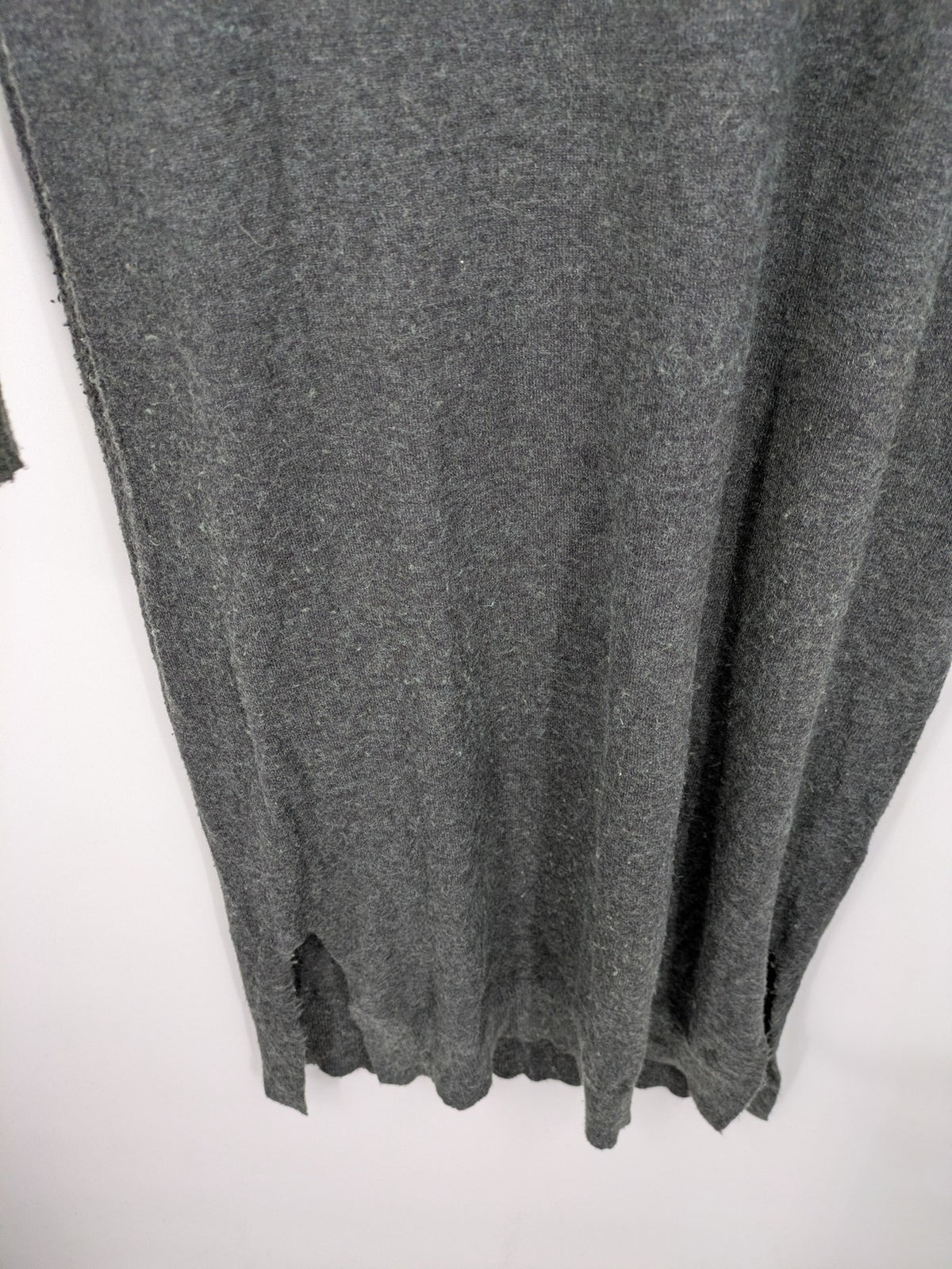 ONLY grey knitted midi dress with roll neck, long sleeves, and side slits.