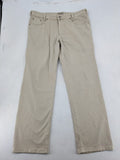 Joker beige straight jeans 5-pocket design with zipper and button closure.