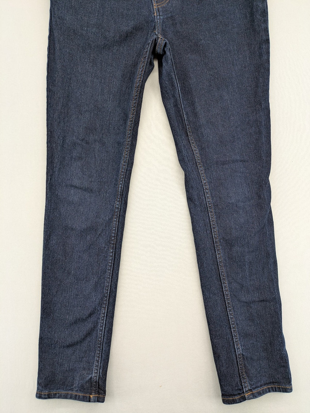 H&M blue skinny fit jeans with classic 5-pocket style and button closure.