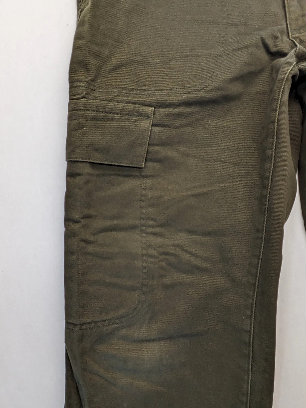 Lands' End green cargo pants with plaid flannel lining and traditional fit design.
