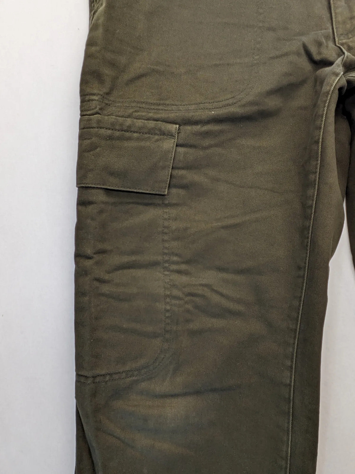 Lands' End green cargo pants with plaid flannel lining and traditional fit design.