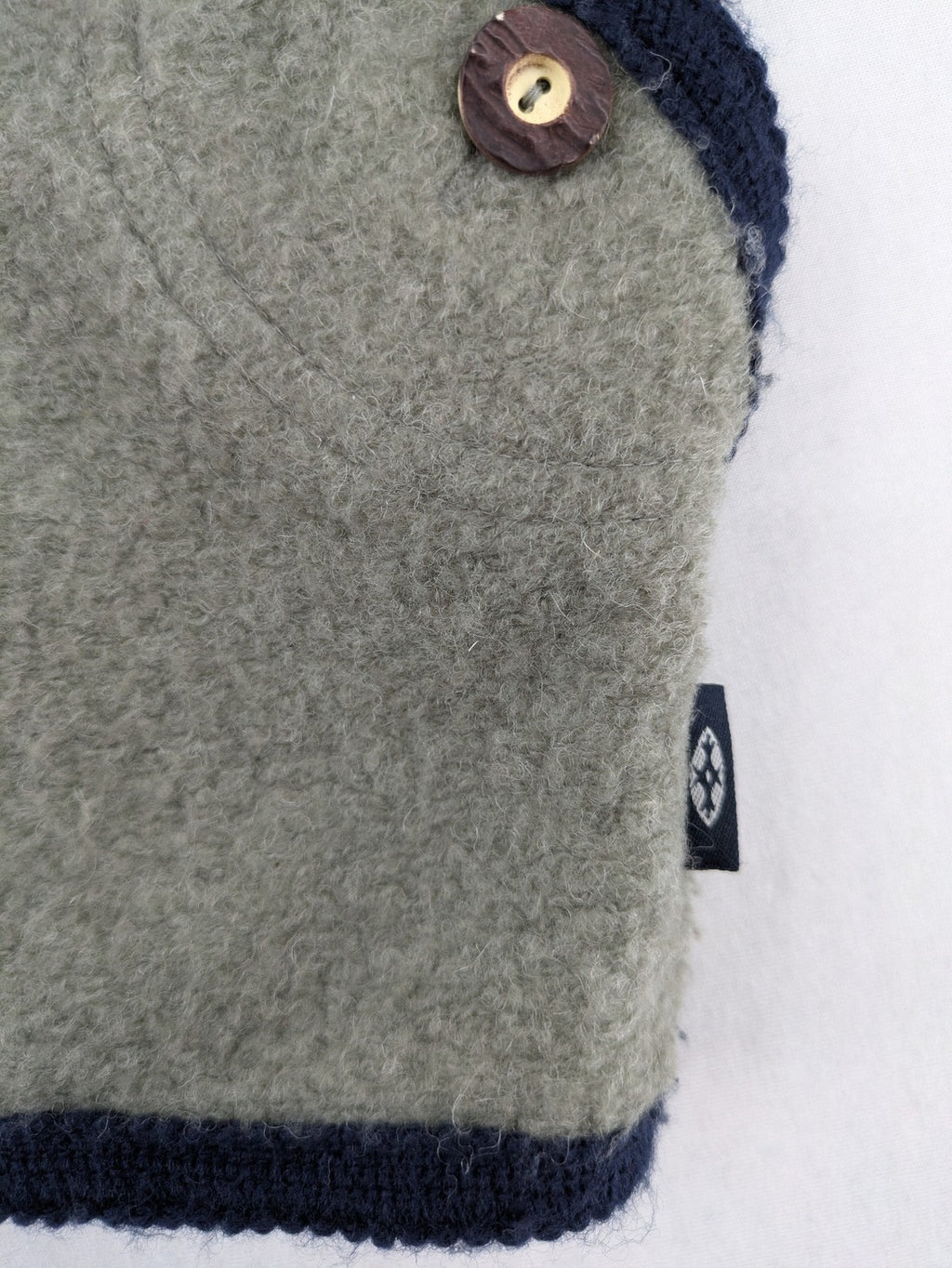 Caramasov grey and navy children's Janker jacket with contrasting trim and rustic buttons.