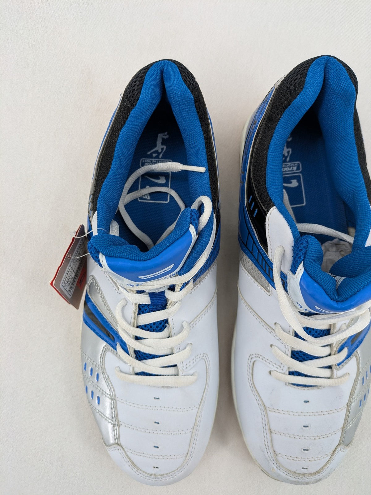 Kronos sports sneakers white, blue, and silver with durable rubber sole and classic design.