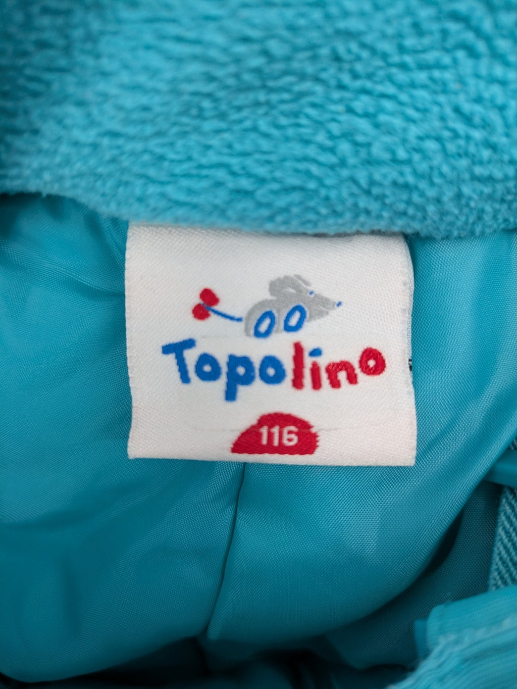 Topolino blue and turquoise snow pants with adjustable straps and fleece-lined bib.
