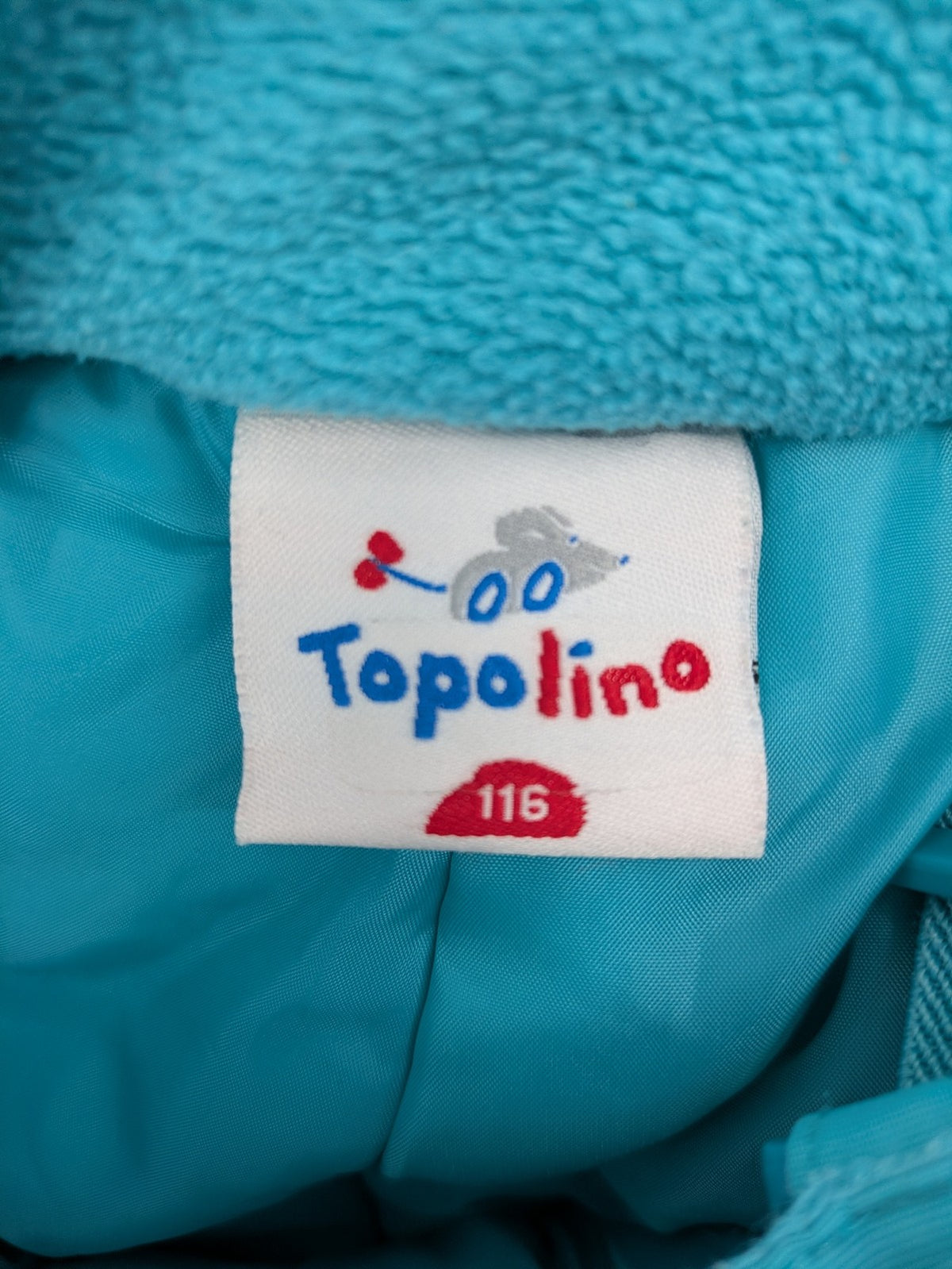 Topolino blue and turquoise snow pants with adjustable straps and fleece-lined bib.