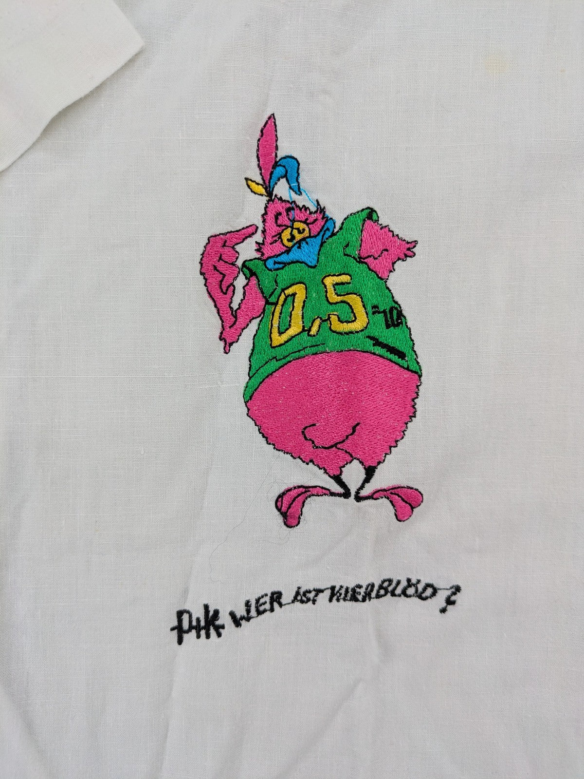 Southwest Castle vintage short-sleeve shirt white with colorful cartoon embroidery and German text.
