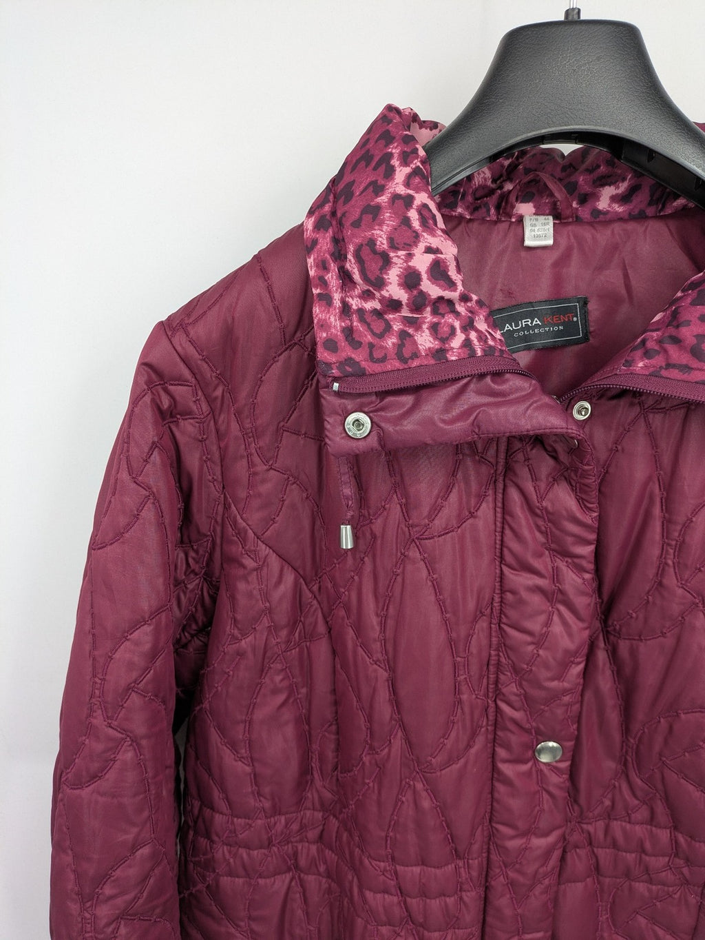 Laura Kent burgundy puffer coat with leopard print collar and cuffs, 100% polyester.