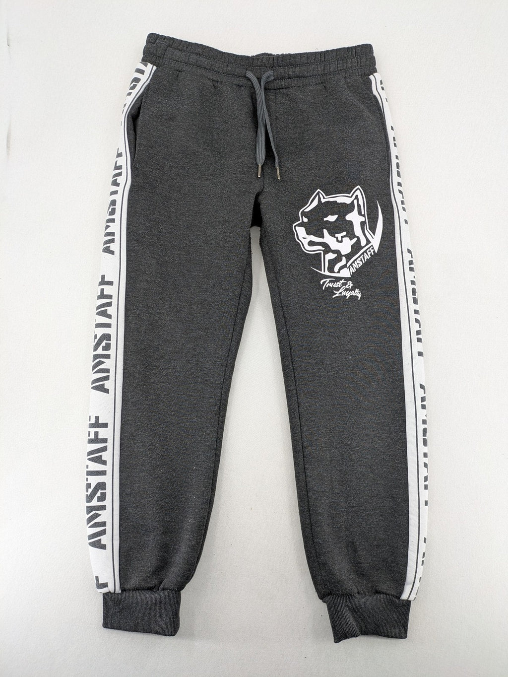 Amstaff grey sweatpants with large dog logo and "Trust & Loyalty" text.