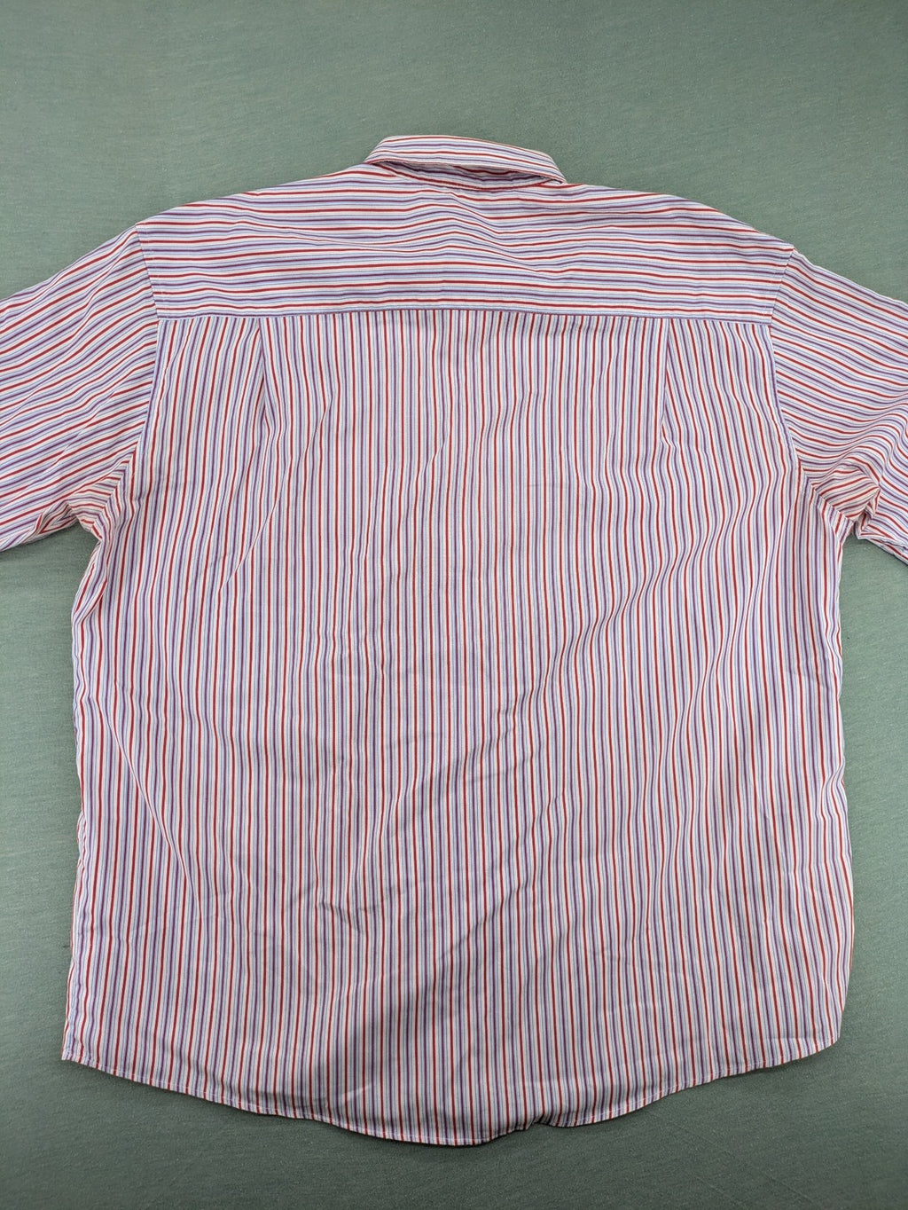 Ken Baker pink short sleeve shirt multicolored striped pattern with chest pocket and classic collar.
