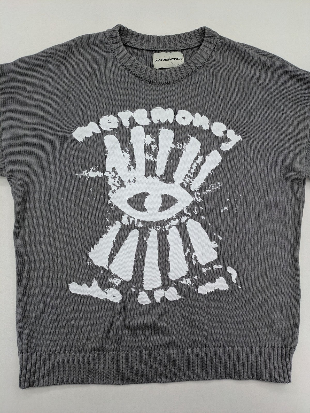 MOREMONEY grey turtle neck jumper with white abstract graphic print and relaxed fit.