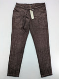 Alma & Lovis brown cord pants with elastic waistband, drawstring, and front patch pockets.