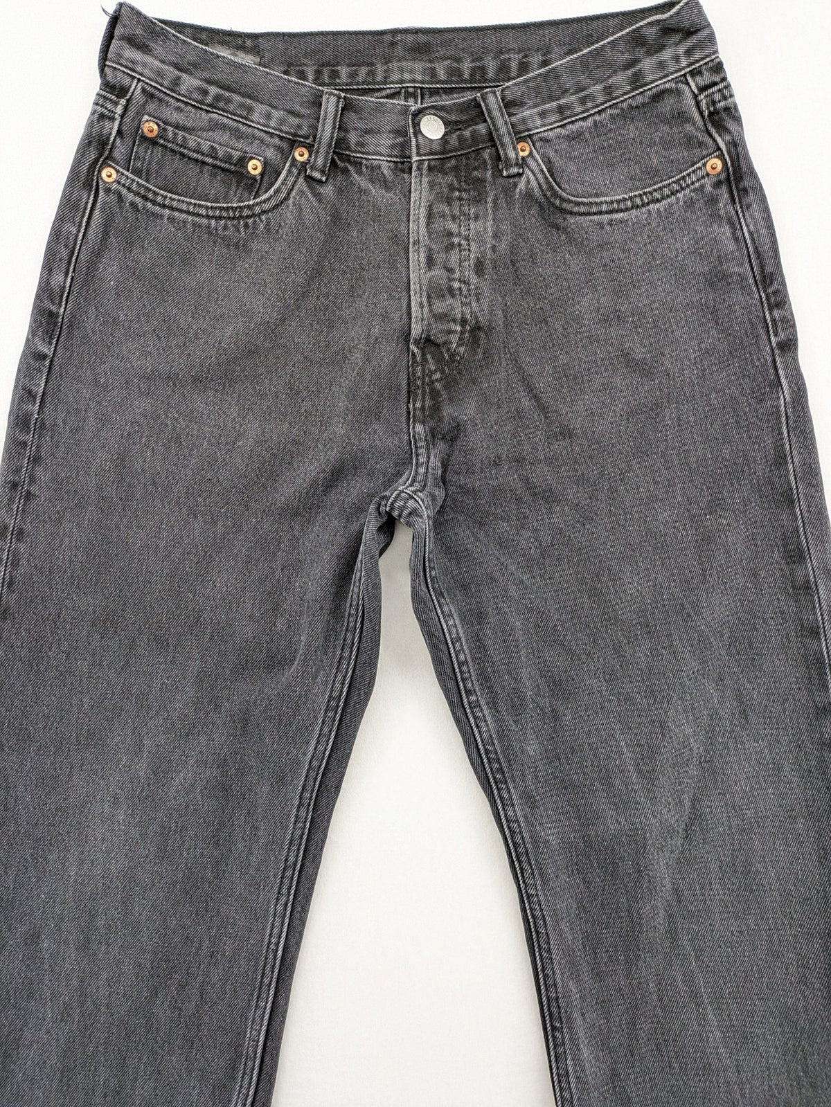 Weekday grey straight jeans with button fly and classic denim design.