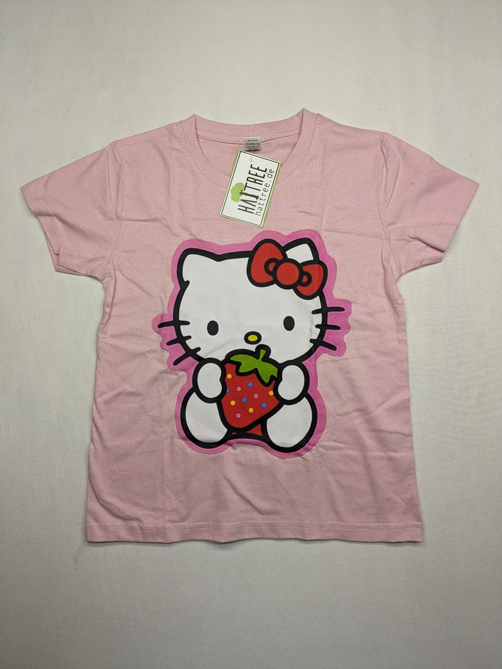 Hello Kitty multi T-shirt pink with large strawberry graphic and short sleeves.