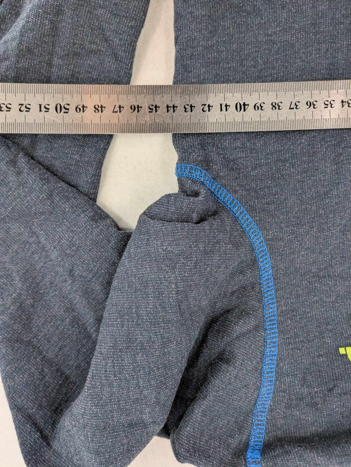 Bench hoodie dark grey with neon green logo and blue contrast stitching.