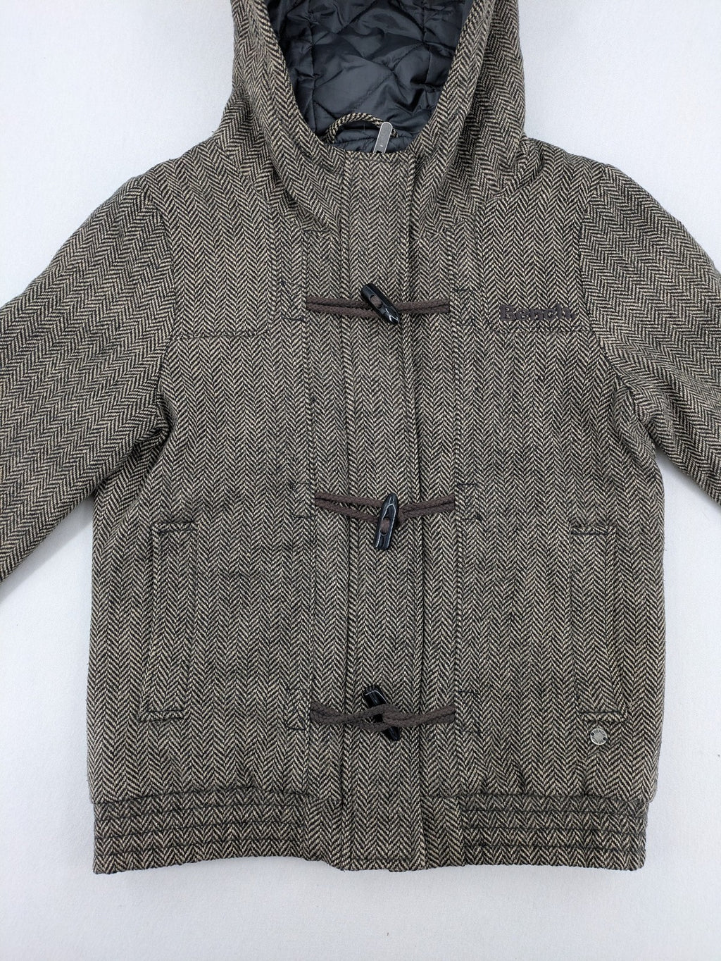 Bench beige-brown duffle coat with herringbone pattern and toggle closures.