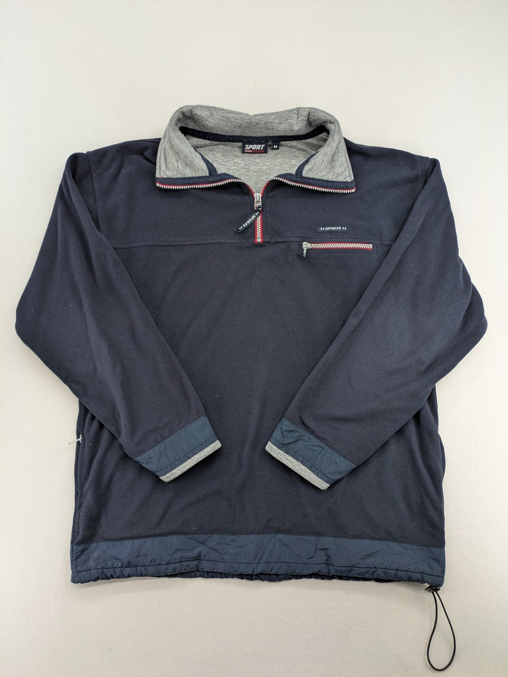 Sport Division turtle neck jumper dark blue fleece with quarter zip and chest pocket.