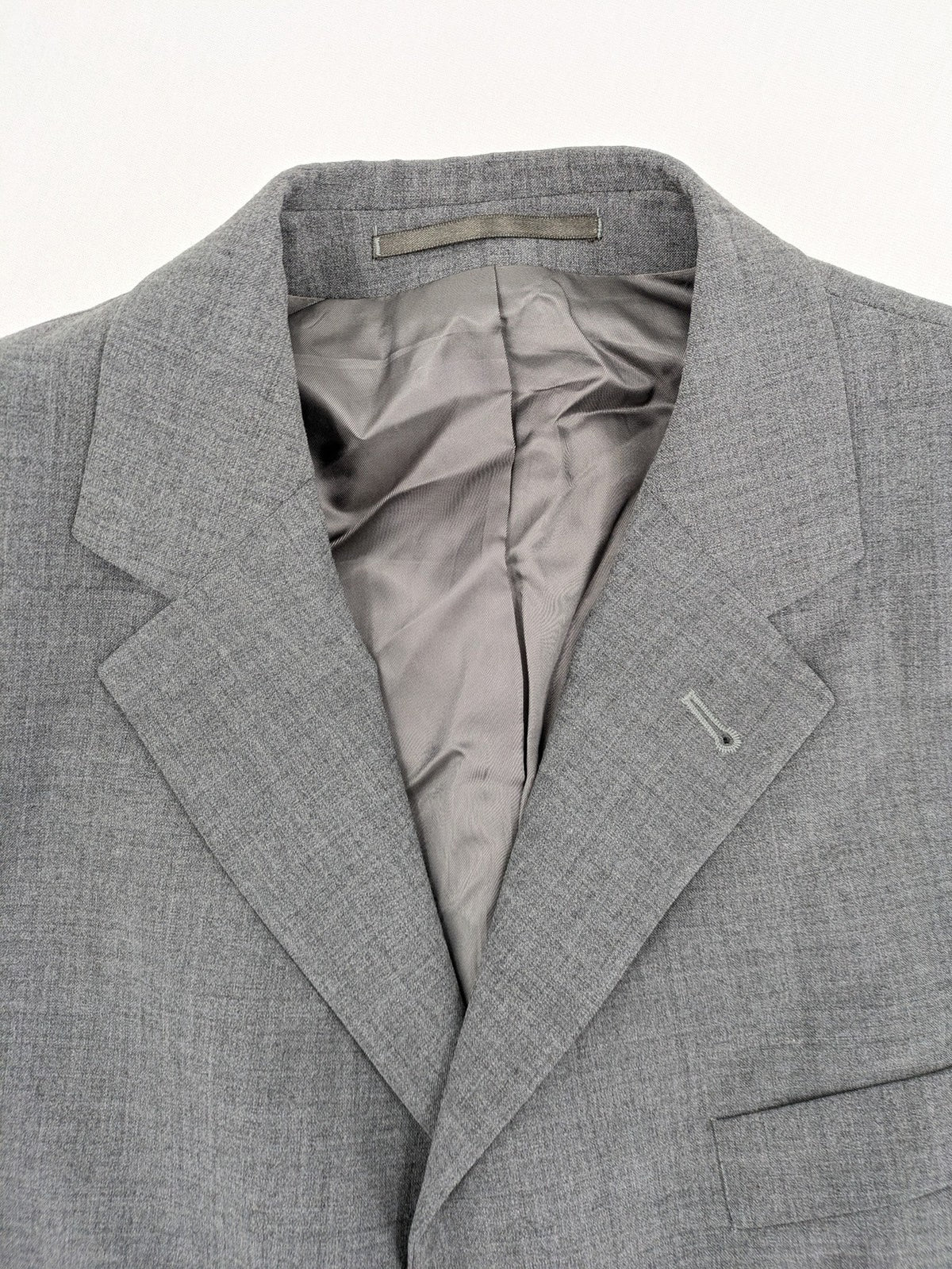 Montego grey blazer three-button design made from wool blend with smooth lining.