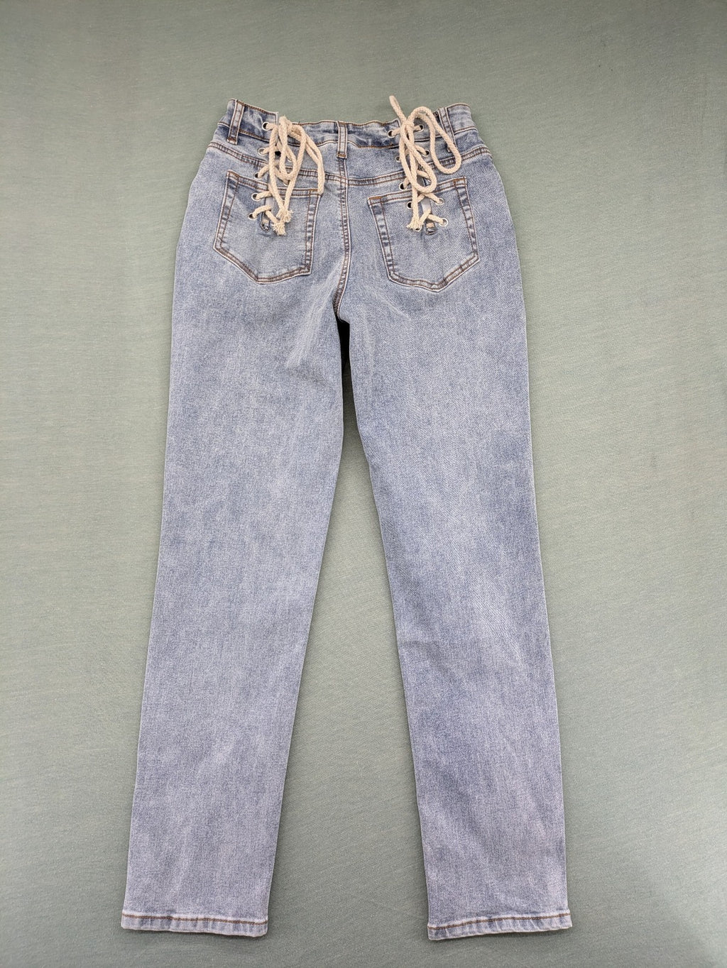 SHEIN blue straight jeans high waist with unique lacing details and stylish design.