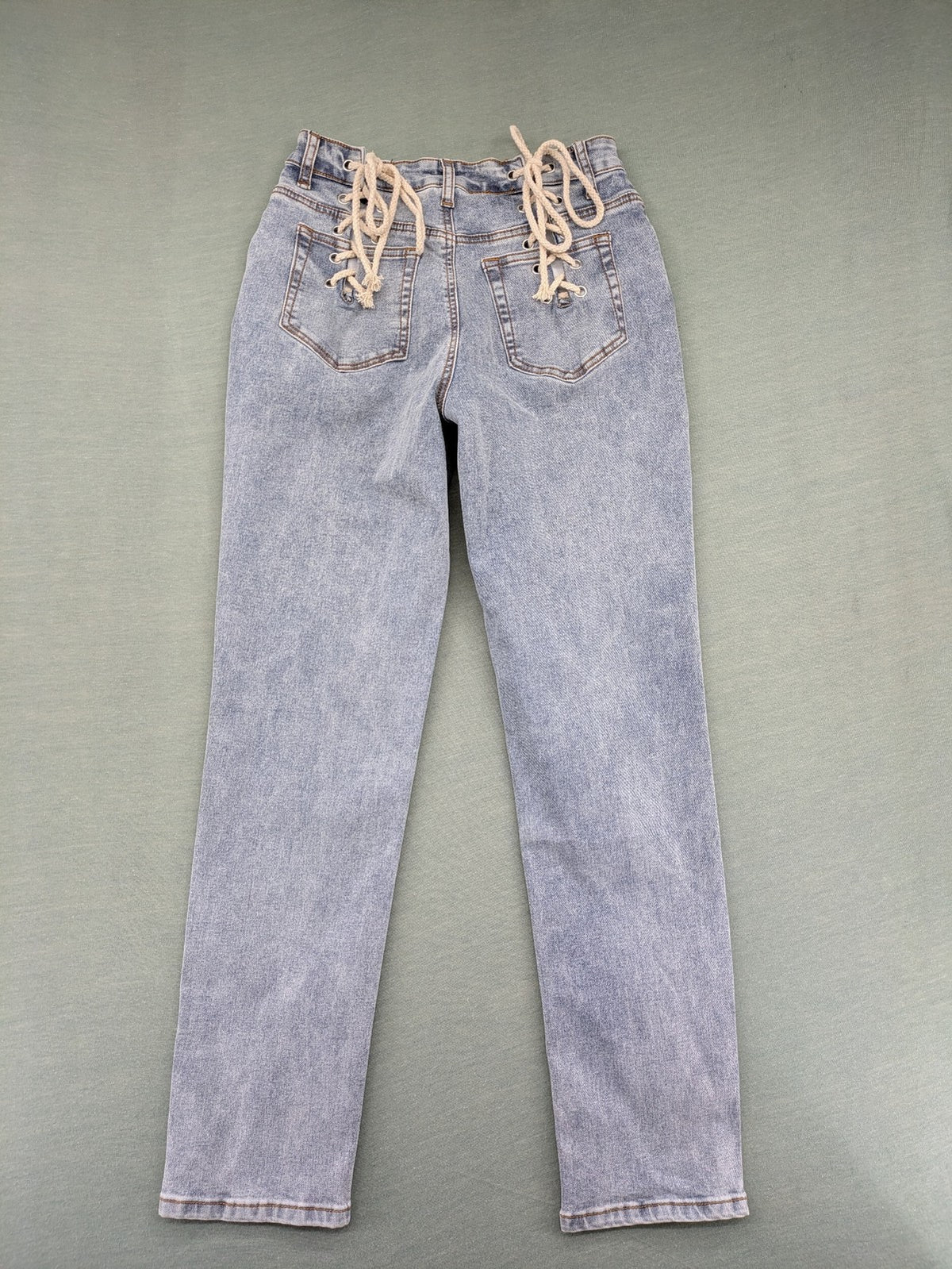 SHEIN blue straight jeans high waist with unique lacing details and stylish design.