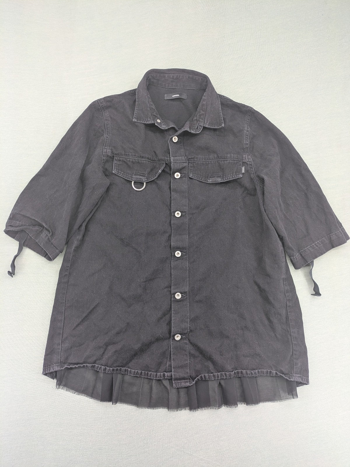 Diesel grey tunic top with denim front, pleated chiffon back, and D-ring detail.