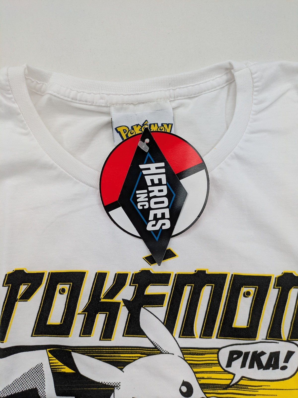 Pokémon multi T-shirt featuring comic graphic of Pikachu, Glurak, Turtok, and Bisaflor.